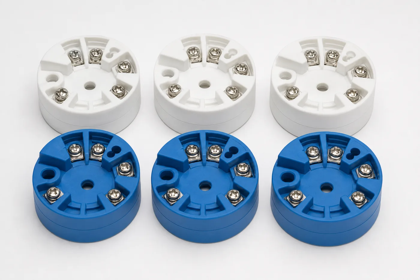 White and blue puck-style head-mount temperature transmitters