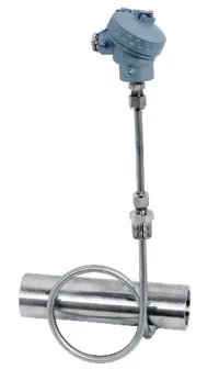 Tube-skin thermocouple installed against process tubing with connection head and mounting hardware